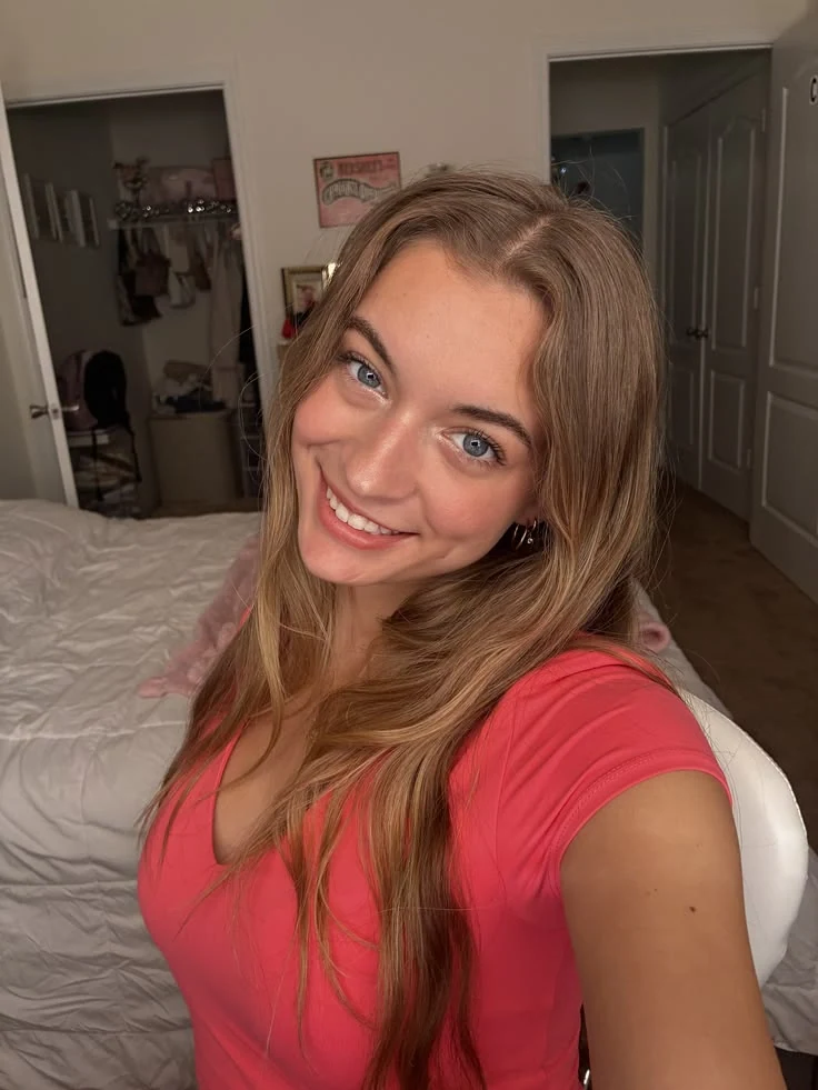 Before: original selfie in a coral shirt